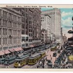 White border postcard.  Woodward Ave looking south, Detroit, Michigan.  Street Cars, trolley.  Linen.