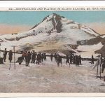 White border postcard. Snowballing and playing on Elliot Glacier, Mt Hood, Oregon.  Skiers.
