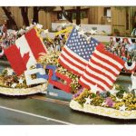 Chrome postcard.  1982 Friends Forever.  Odd Fellow-Rebekah Rose Parade Float.  American and Canadian Flags.
