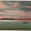 Old postcard. Beaver Dam, Wisconsin, autumn sunset on Beaver Lake.  People, boat.