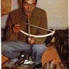 Chrome postcard.  Little Diomede Eskimo, Ivory carver with mouth drill.