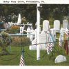 White border postcard.  Betsy Ross Grave, Philadelphia, Pennsylvania. Flags.