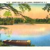 Linen Postcard.  Sunrise scene on Lake Osceola, Hendersonville, North Carolina. Boat.