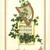 Old postcard.  St Patrick's Day. Come Back to Erin, Dear Old Ireland. Harp, shamrocks,1913.  Embossed.