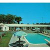 Chrome postcard.  Salt Meadow Motel, West Harwich, Cape Cod, Massachusetts. Owned and operated by Barbara S Stengel.  Pool, cars. 1970.
