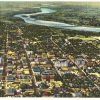 Linen postcard.  Business Section, looking South showing Rio Grande River, Albuquerque, New Mexico. 1951. Aerial View.
