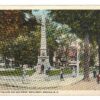 White border postcard.  Abbott Square and Soldiers Monument, Nashua, New Hampshire. Old car.
