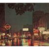 Chrome postcard. Night along Rush Street, Chicago, Illinois. Signs: Hotel Maryland, Tonys Cellar, Mammy's Pancake House, The Pussycat.  1966.