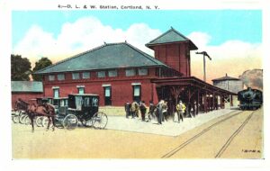 White border postcard.  L & W Station, Cortland, New York.  Train Station.  Horse and carriage.