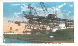 White border postcard.  Steamer Sinaloa unloading coal at Pittsburgh Coal Dock No. 7, Duluth, Minnesota.  Ship.  1923.