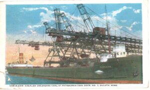 White border postcard. Steamer Sinaloa unloading coal at Pittsburgh Coal Dock No. 7, Duluth, Minnesota. Ship. 1923.