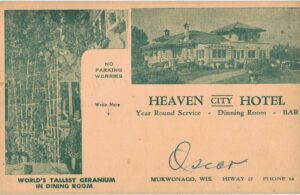 Old postcard.  Heaven City Hotel, Mukwonago, Wisconsin. World's tallest geranium in dining room. 1952.  A J Moore, Director.