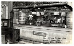 Real photo postcard.  Knott's Berry Farm, The Silver Dollar Bar, Buena Park, California. RPPC