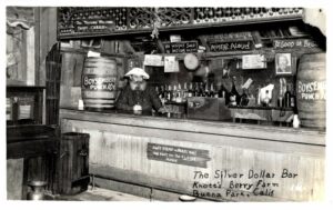 Real photo postcard.  Knott's Berry Farm, The Silver Dollar Bar, Buena Park, California. RPPC